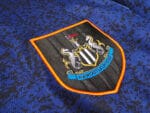 maglia Newcastle vintage 97/98 away Adidas dettaglio logo Newcastle